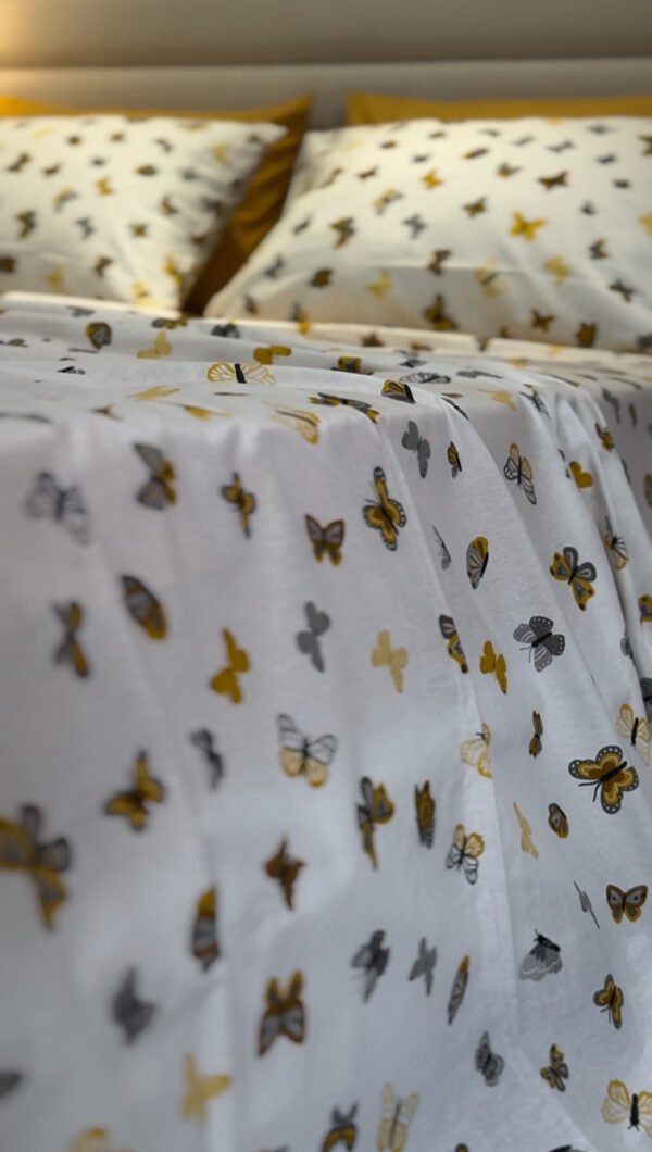 Parure de Lit Papillon Doré – Éclat Naturel et Douceur
